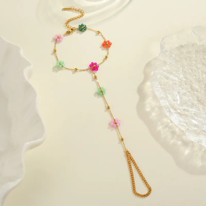 Βραχιόλι με δαχτυλίδι ατσάλινο με λουλούδια - BR364