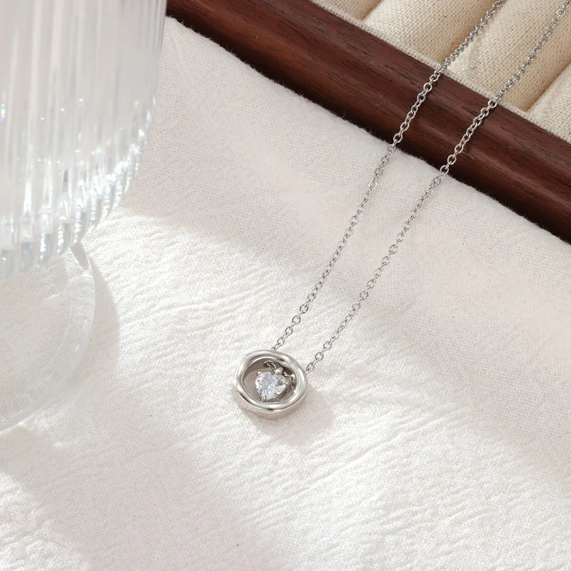 Colier din oțel cu inel și inimă în interior-NE424