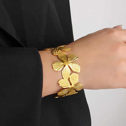 Bracelet gilded steel wide with flowers-br019