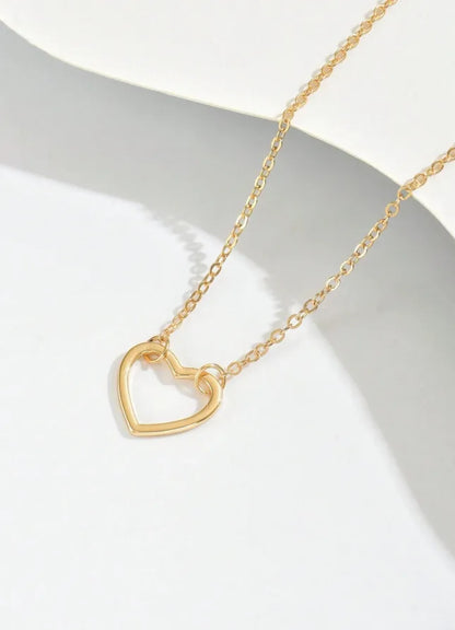 Steel necklace with thin golden heart- NE058
