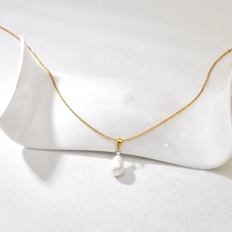 Κολιέ επιχρυσωμένο ατσάλι με πέρλα και zircon-NE549