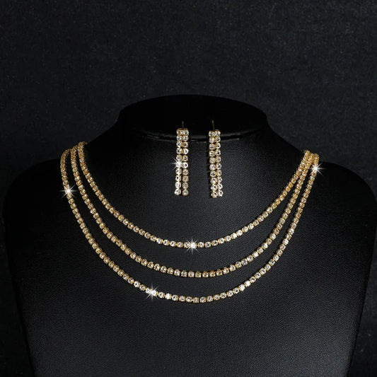 Conjunto triple collar y pendientes de strass dorados - set025