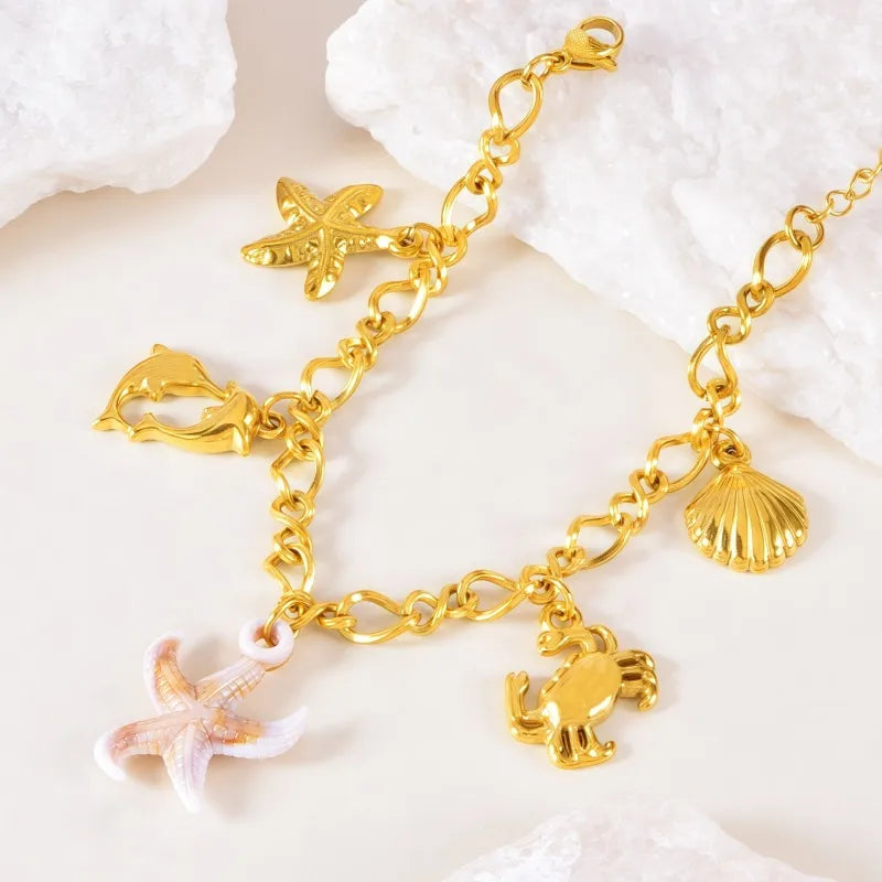 Bραχιόλι ατσάλινο χρυσό με charms - BR506