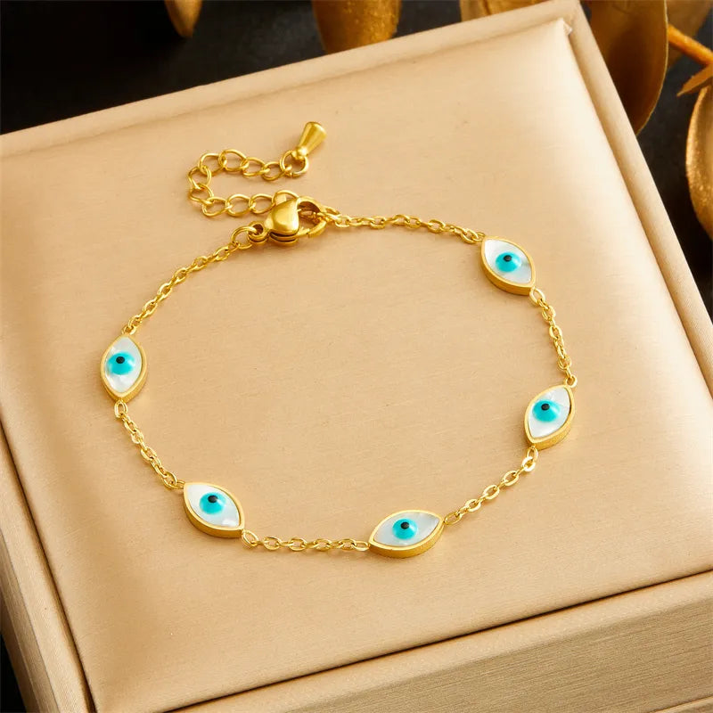 Bracelet with turquoise eyes of gold steel-br182