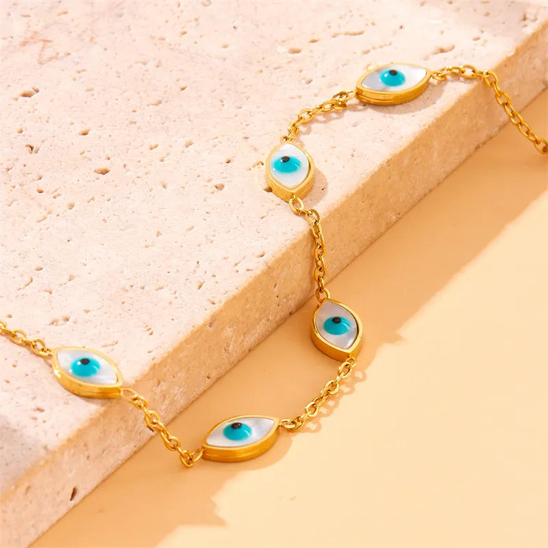 Bracelet with turquoise eyes of gold steel-br182