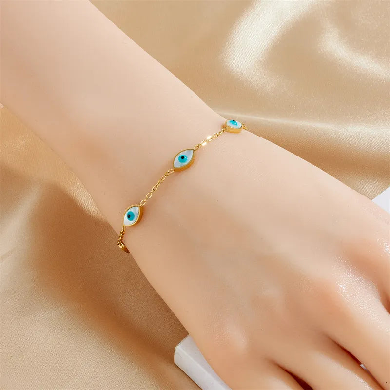 Bracelet with turquoise eyes of gold steel-br182