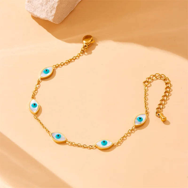 Bracelet with turquoise eyes of gold steel-br182