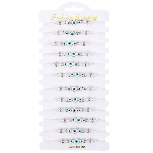 Σετ 12αδα βραχιόλια με διάφανα ματάκια - SET093