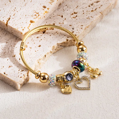 Bratara din otel placat cu aur cu strasuri si brelocuri-BR095