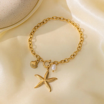 Βραχιόλι επιχρυσωμένο ατσάλι με αστερία και κοχύλι - BR415