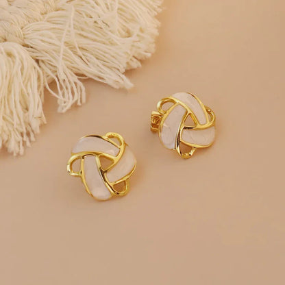 Steel earrings with white knot-ea351