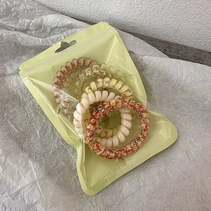 Λαστιχάκια πλαστικά σπιράλ σε σακουλάκι -6τμχ/set - HA056