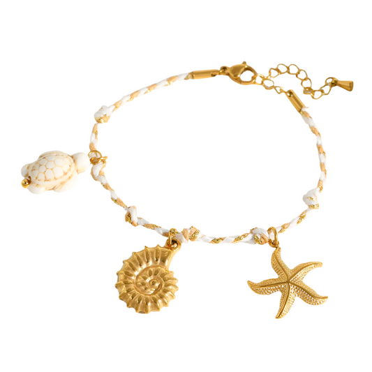 Bracelet gilded steel shells with white cord-