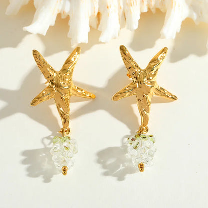 Steel earrings with starfish and grapes -