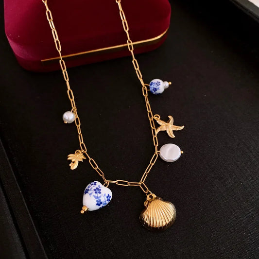 Κολιέ ατσάλινο με χρυσά στοιχεία - ne605