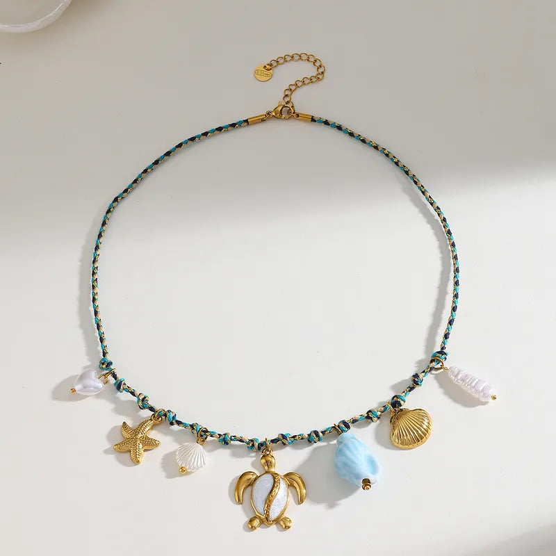 Colier cu frânghie albastră și brelocuri