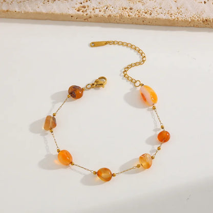 Βραχιόλι ατσάλινο με πορτοκαλί πέτρες - BR389