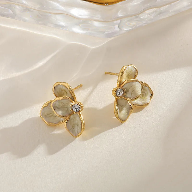 Earrings gilded steel beige petals with zircon-ea268