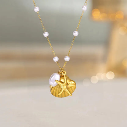 Κολιέ επιχρυσωμένο ατσάλι με κοχύλι και πέρλα- NE692