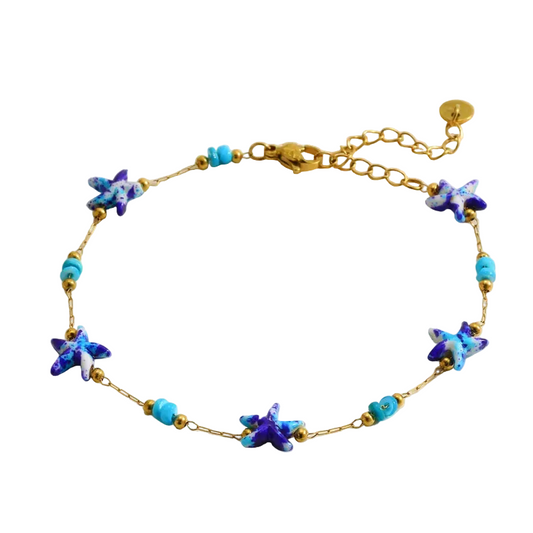 Βραχιόλι επιχρυσωμένο ατσάλι με μπλε αστερίες - BR511