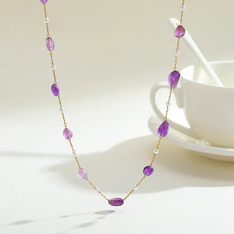 Steel necklace with purple stones - NE578