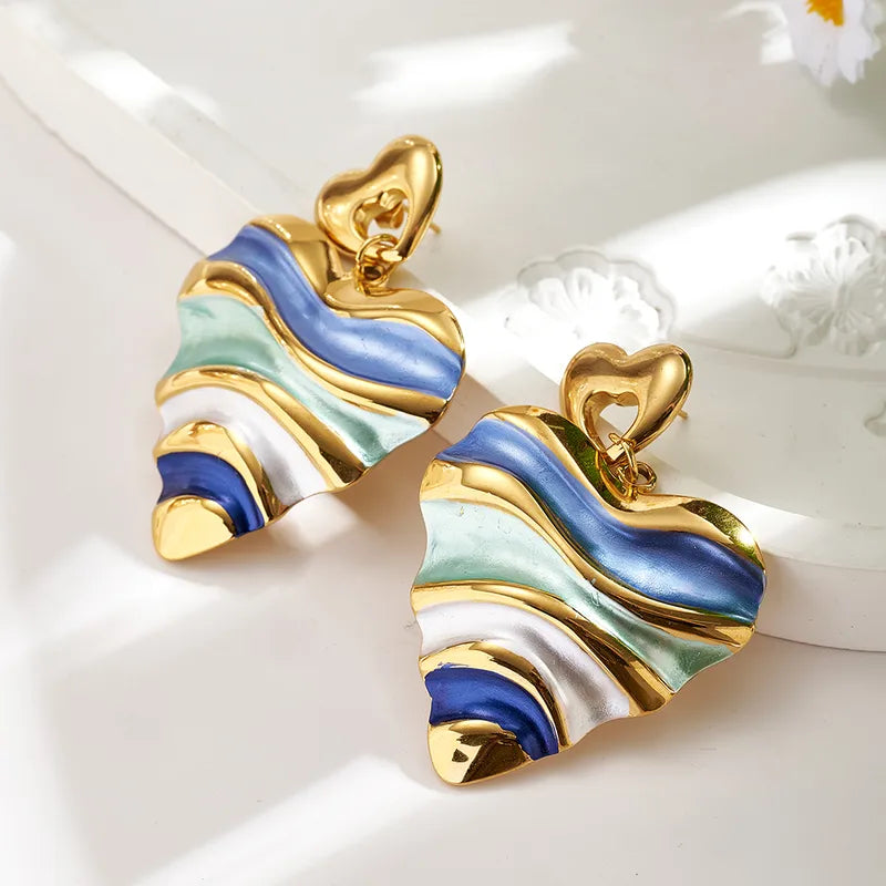 Σκουλαρίκια ατσάλι καρδιά με μπλέ αποχρώσεις - EA001