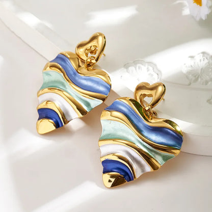 Σκουλαρίκια ατσάλι καρδιά με μπλέ αποχρώσεις - EA001