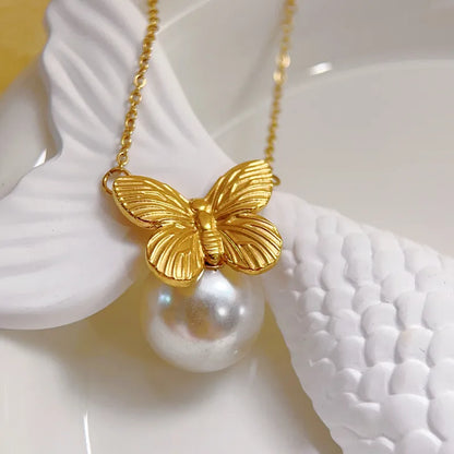 Κολιέ ατσάλι με πέρλα και πεταλούδα-NE333