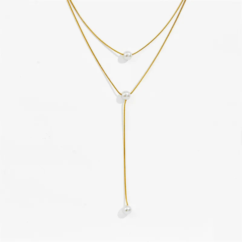 Steel pendant necklace with pearls - NE417