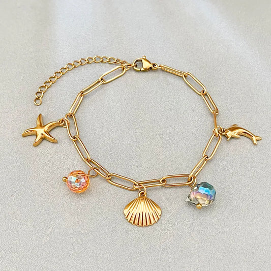 Pulsera de acero y oro con dijes de verano - BR471