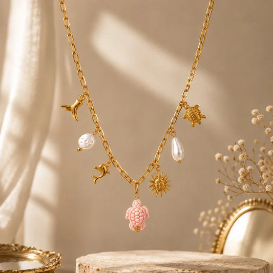 Steel necklace with pink zircon hearts - NE426