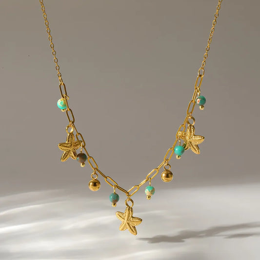 Necklace with blue beads and steel starfish - NE449