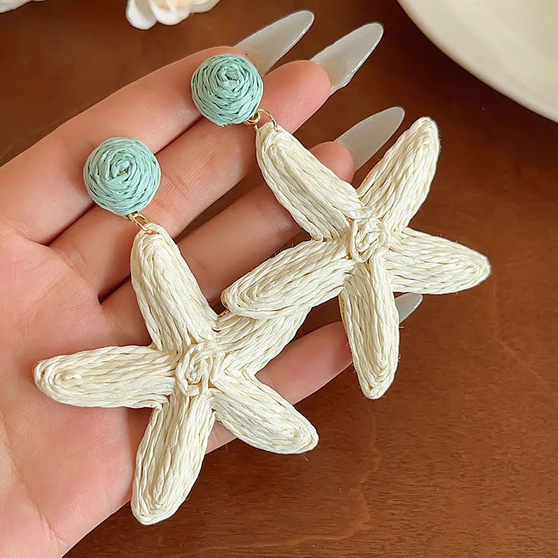 Pendientes estrella de mar de acero con piedras azules- EA681