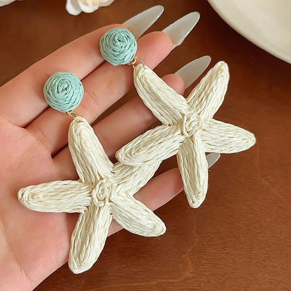 Pendientes estrella de mar de acero con piedras azules- EA681