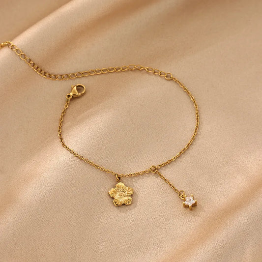 Bracciale gamba in acciaio con zircone colorato - AN039