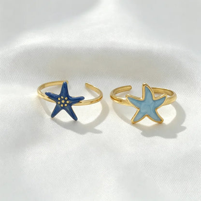 Anillo de acero con cristales verdes- R130
