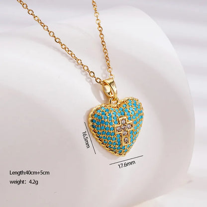 Gold necklace with blue beads and heart cross - NE386