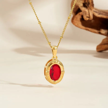 Collier acier doré avec cristal rouge - NE737