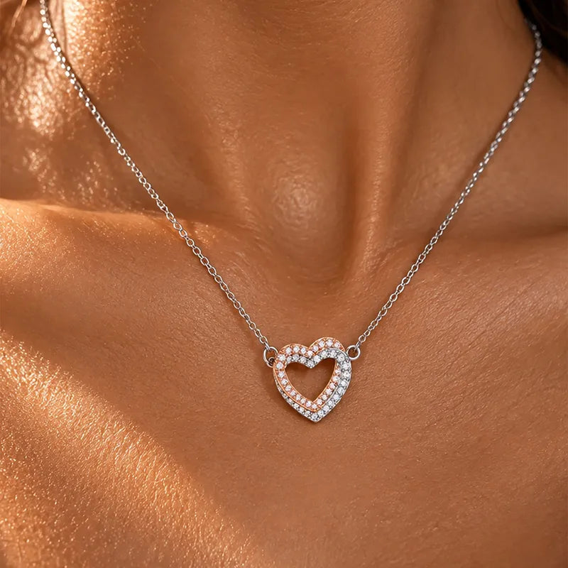 Collier en acier avec coeur en argent et or rose avec zircon - NE451