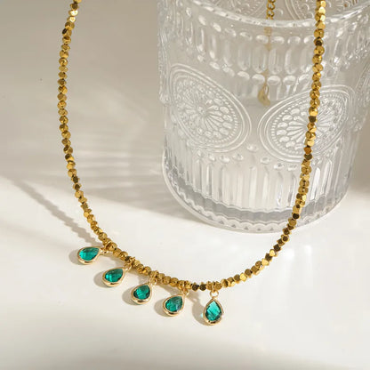 Steel gold necklace with petroleum stones - NE793
