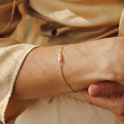 Βραχιόλι επιχρυσωμένο ατσάλινο λεπτό με πέρλα-BR304