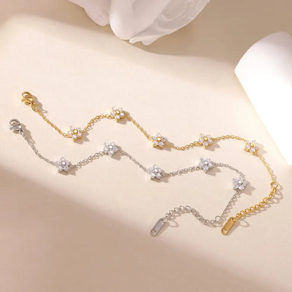 Βραχιόλι χρυσό ατσάλι με αστραφτερά λουλούδια-BR100