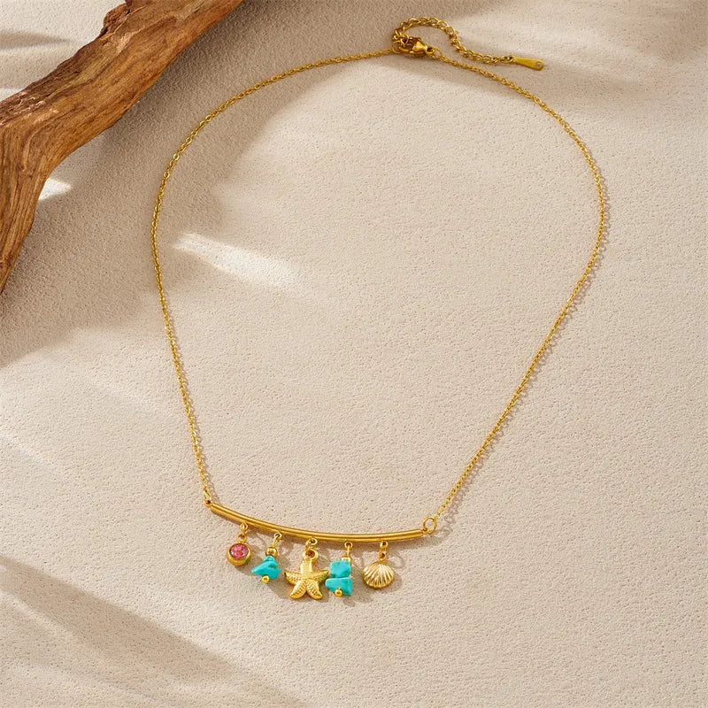 Collier en acier avec étoiles de mer et pierres - NE611