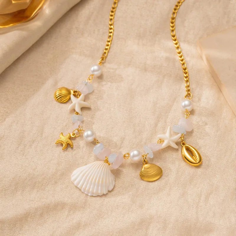 Collana in acciaio con cuori di zirconi rosa - NE426
