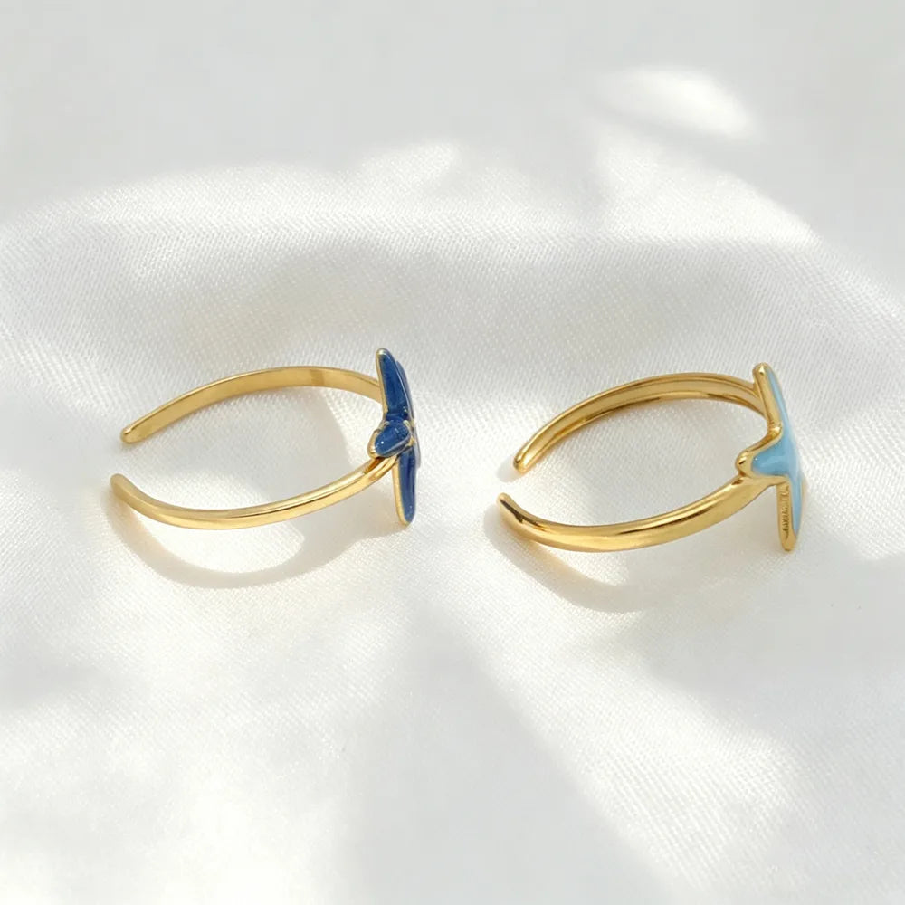 Anillo de acero con cristales verdes- R130