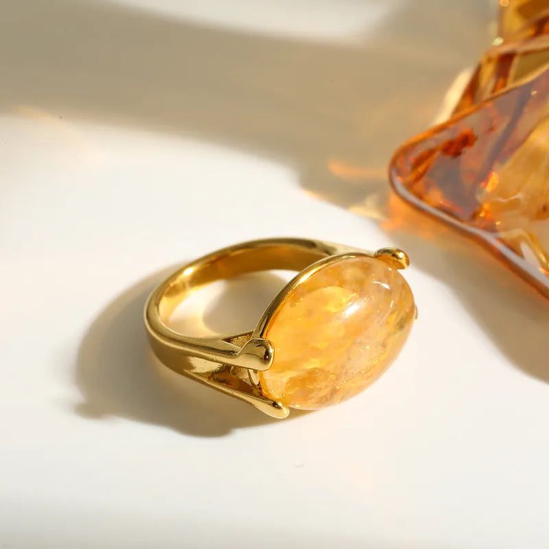 Inel din oțel placat cu aur cu piatră galbenă - R093