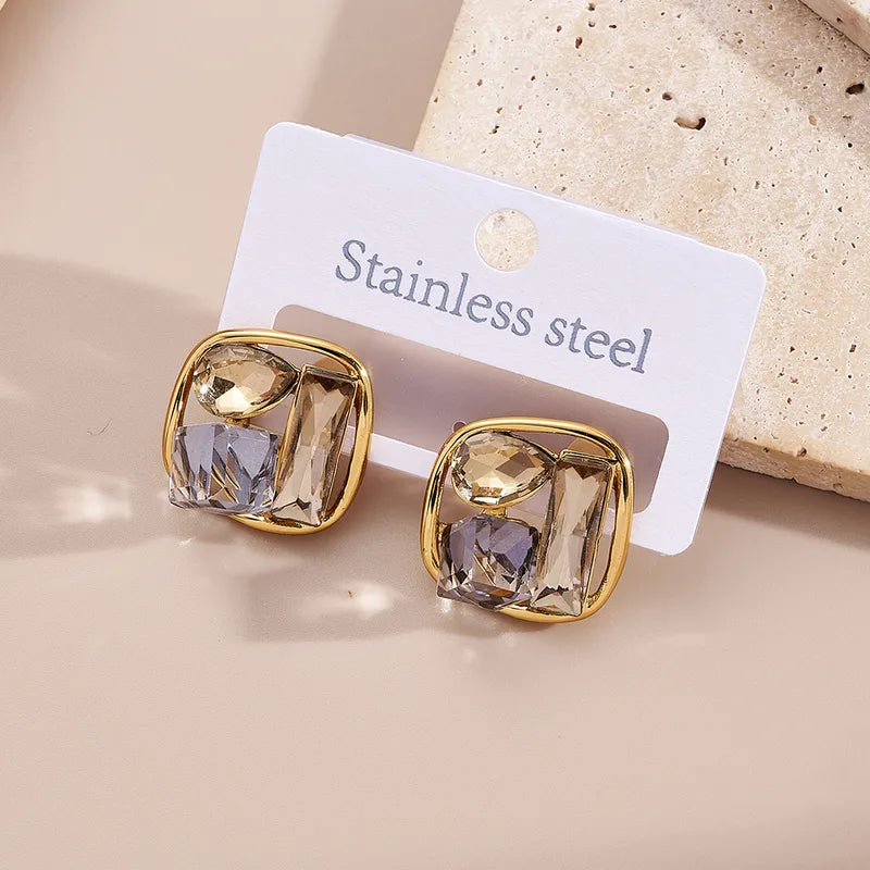 Pendientes de acero bañado en oro con circonitas verdes - EA115