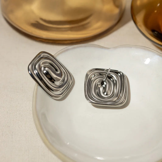 Earrings of steel squares with spiral-ea162