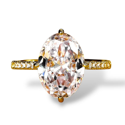 Gold ring with central oval zircon and perimeter zircon - R178