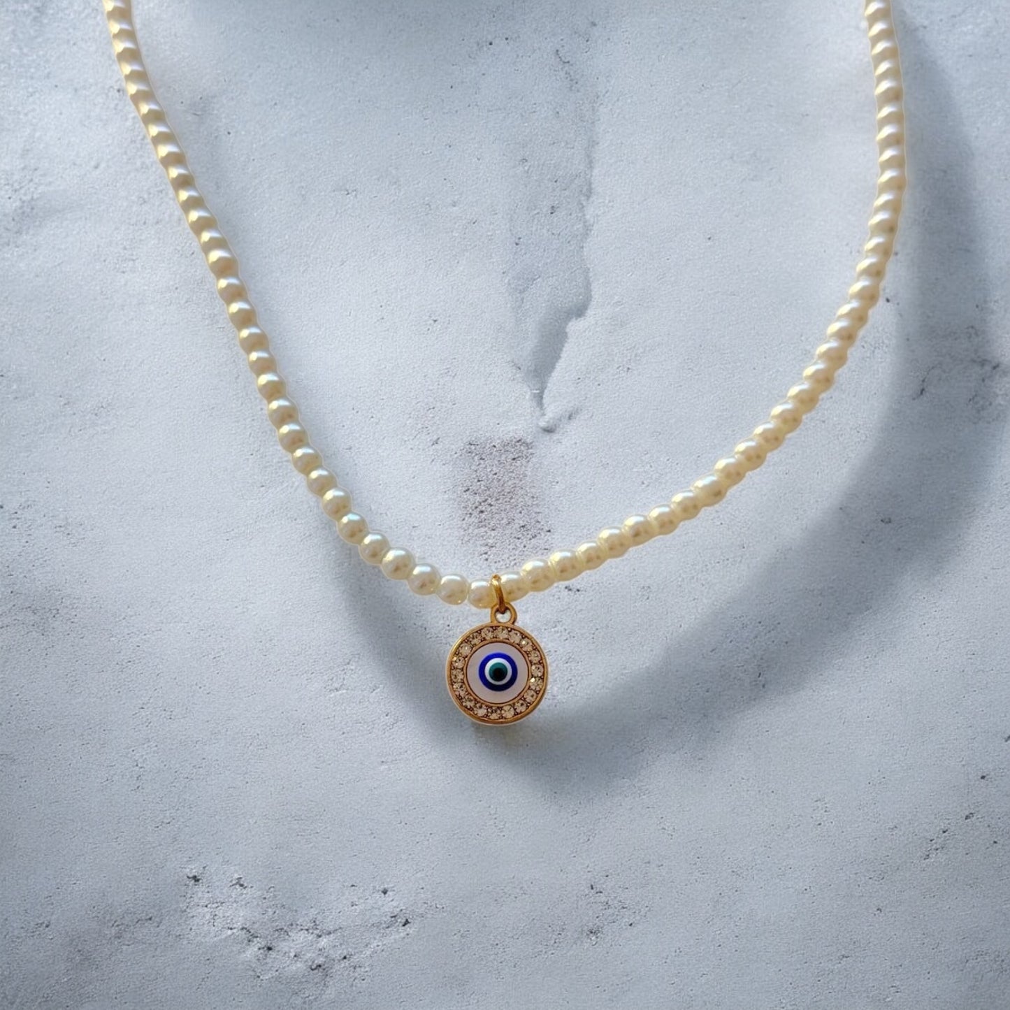 Necklace with pearls and pendant circular eye - Ne179